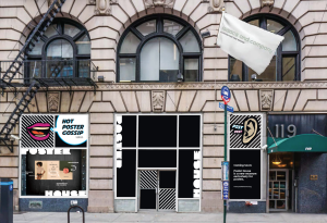 The entrance of Poster House at 23rd street with blackout windows.