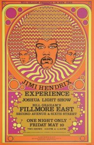 An orange poster of 3 heads with geometric abstract afros and bubbly patterns around the text.