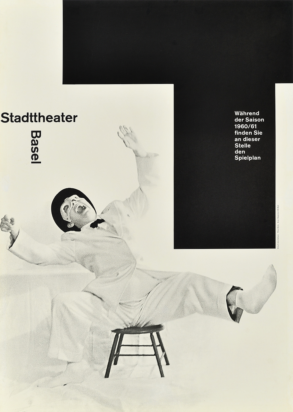 photographic poster of a man in a white costume laughing exaggeratedly on a small wooden chair