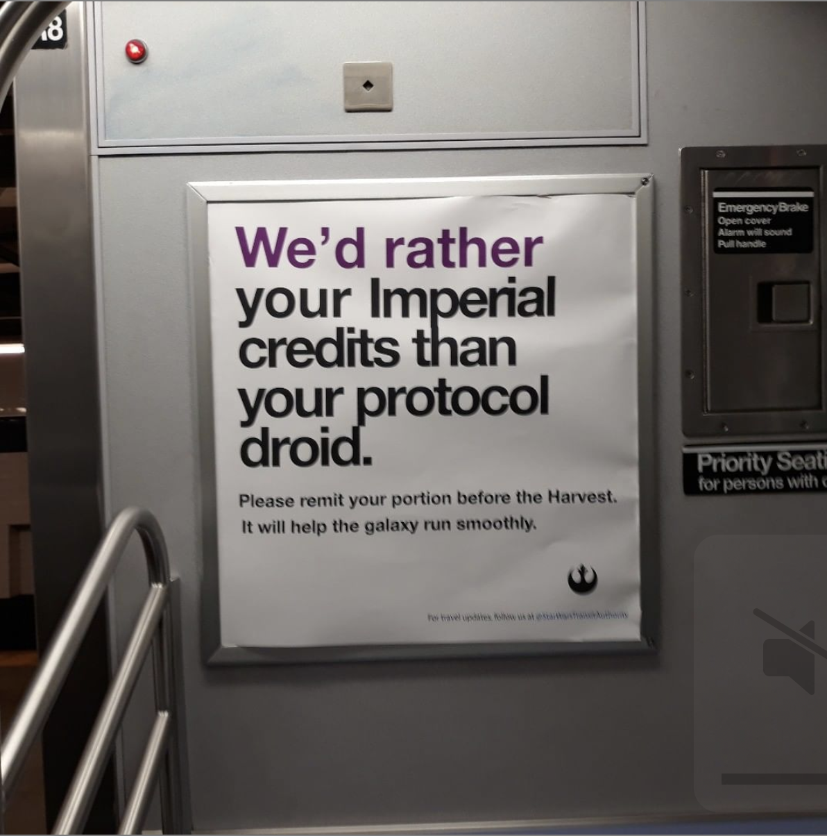 type-based poster inside an MTA subway cart titled 