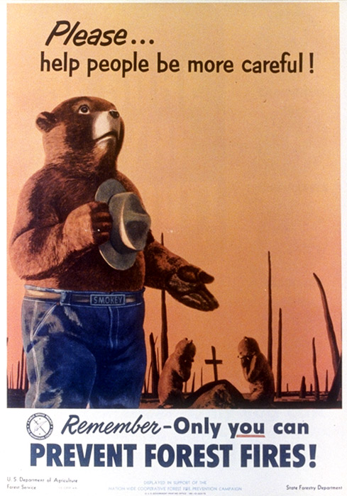 illustrational poster of a bear holding a hat to his chest and other bears mourning in the background