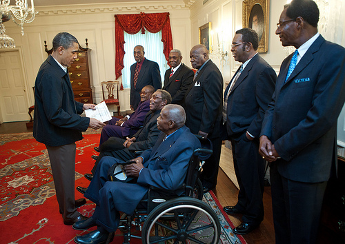 President Barack Obama speaks with surviving participants of the Memphis Sanitation Strike. Photo credit: Lawrence Jackson/Official White House Photo