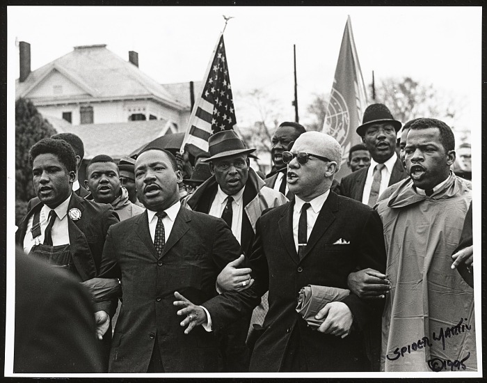 A photograph of Martin Luther King Jr. arm-in-arm with fellow Selma to Montgomery marchers. Photo credit: Spider Martin/Collection of the Smithsonian National Museum of African American History and Culture © 1965 