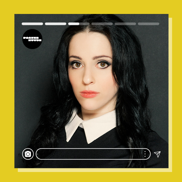 A headshot of a woman with long black hair and a white collared shirt and Instagram-style accents.