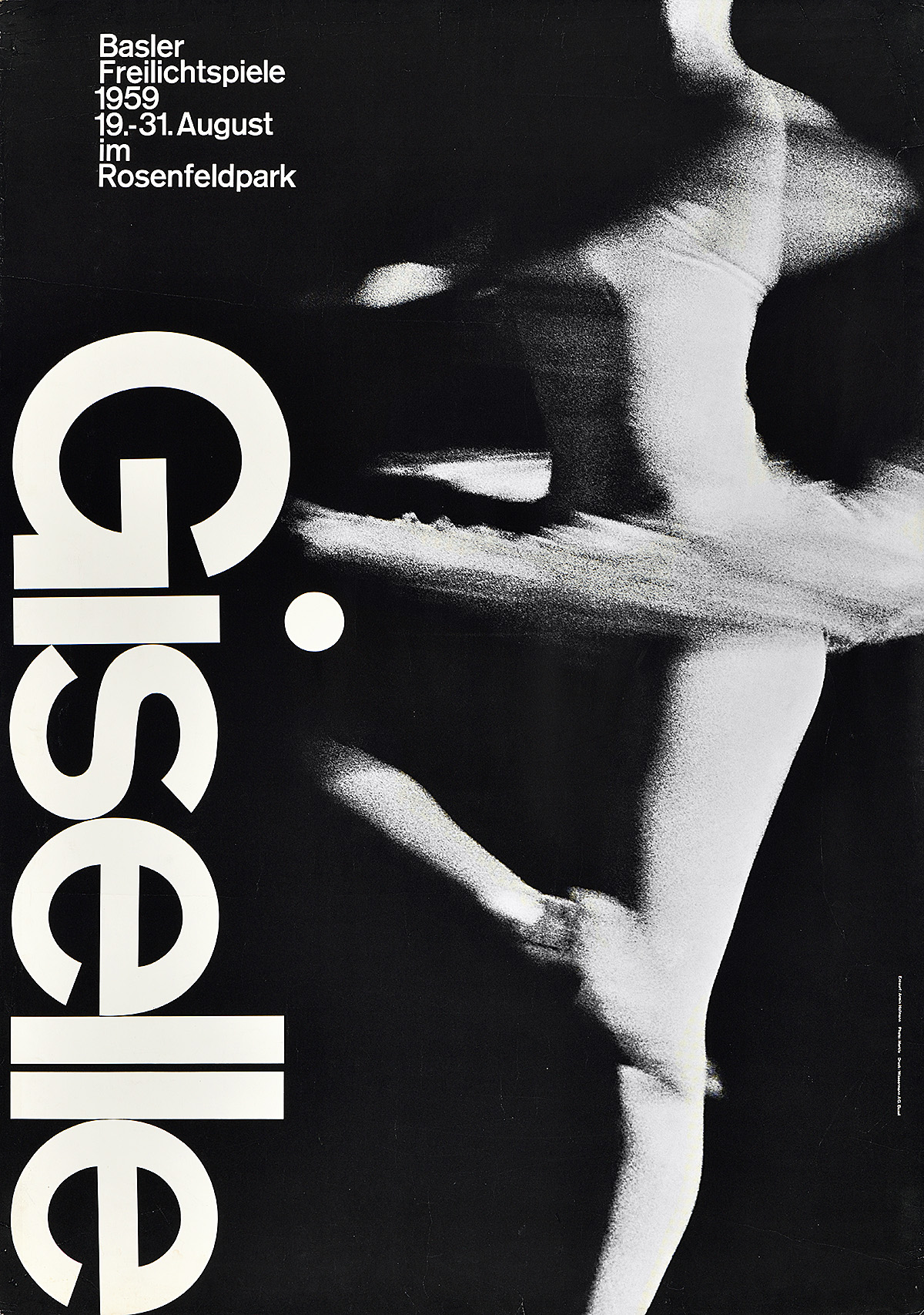 photographic poster of a ballerina in mid-pirouette, her bottom foot and head cut off. The word giselle runs down the left side of the poster