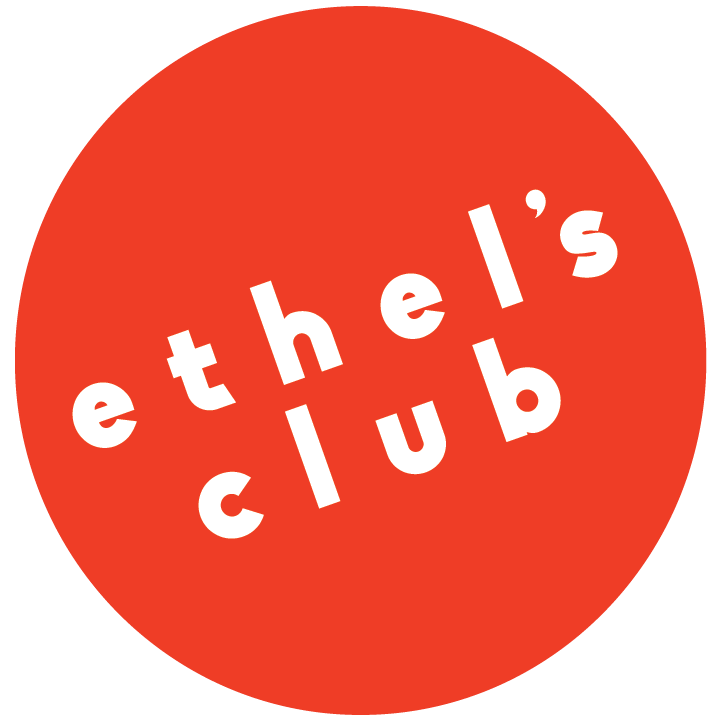 Red Circle logo. A red circle with Ethel's Club in white text at an angle.