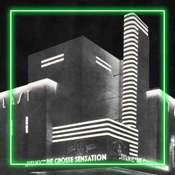 A black and white photograph of a building with neon, surrounded by a green neon square.