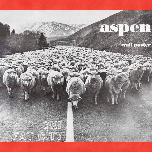 A poster featuring hundreds of sheep in black and white herding in the middle of a highway against a mountainous backdrop.