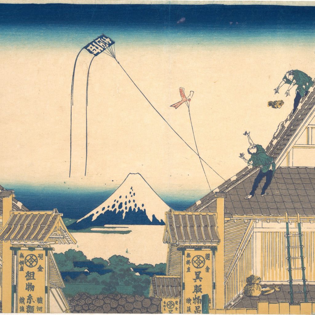 A woodblock print of two buildings side by side separated by a mountain in the gap.