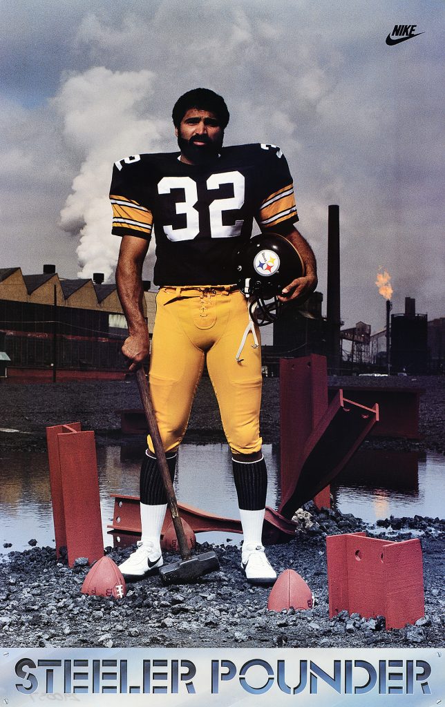 Poster of a football player standing against an ominous background.