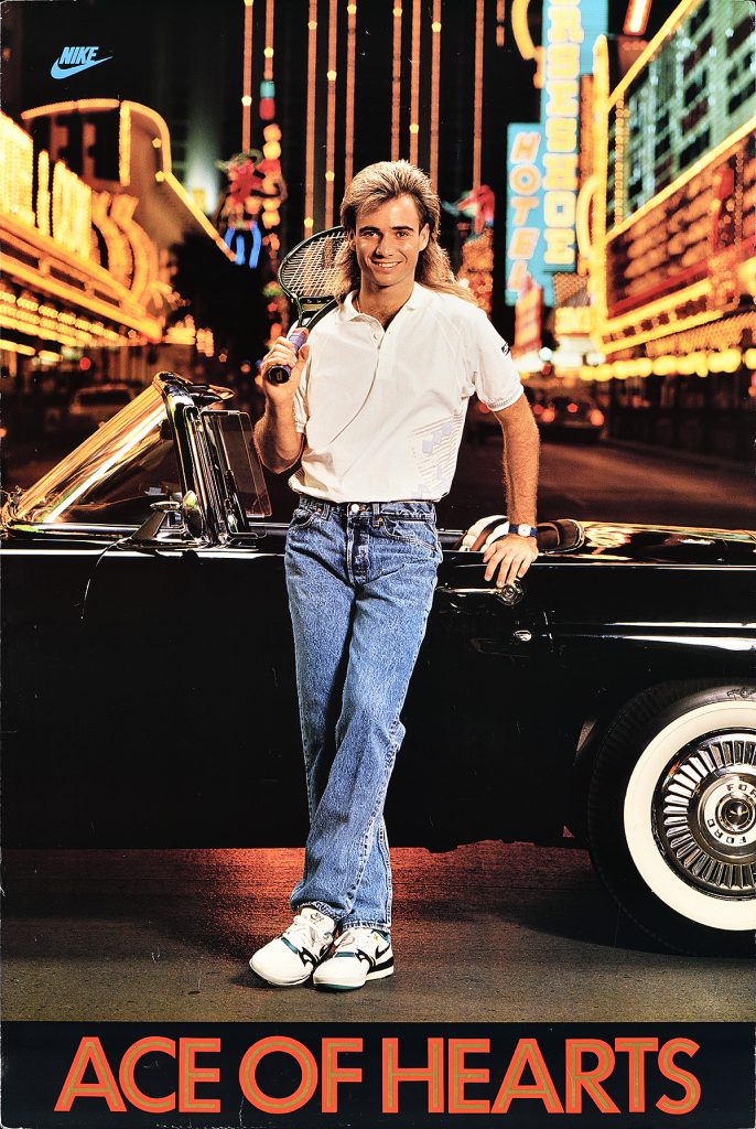 Poster of a man leaning against a black convertible in Times Square.