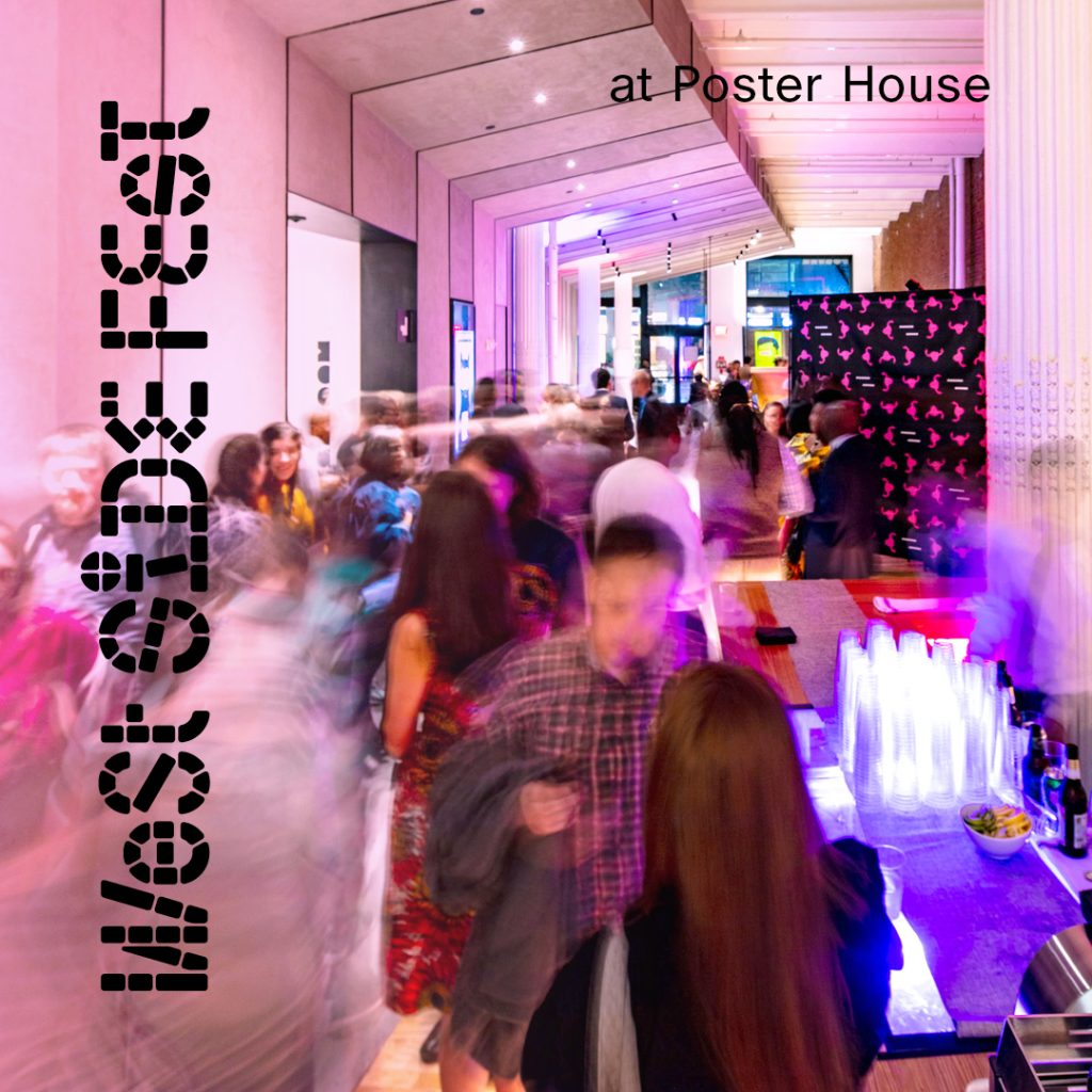 A group of people during a party in a museum.