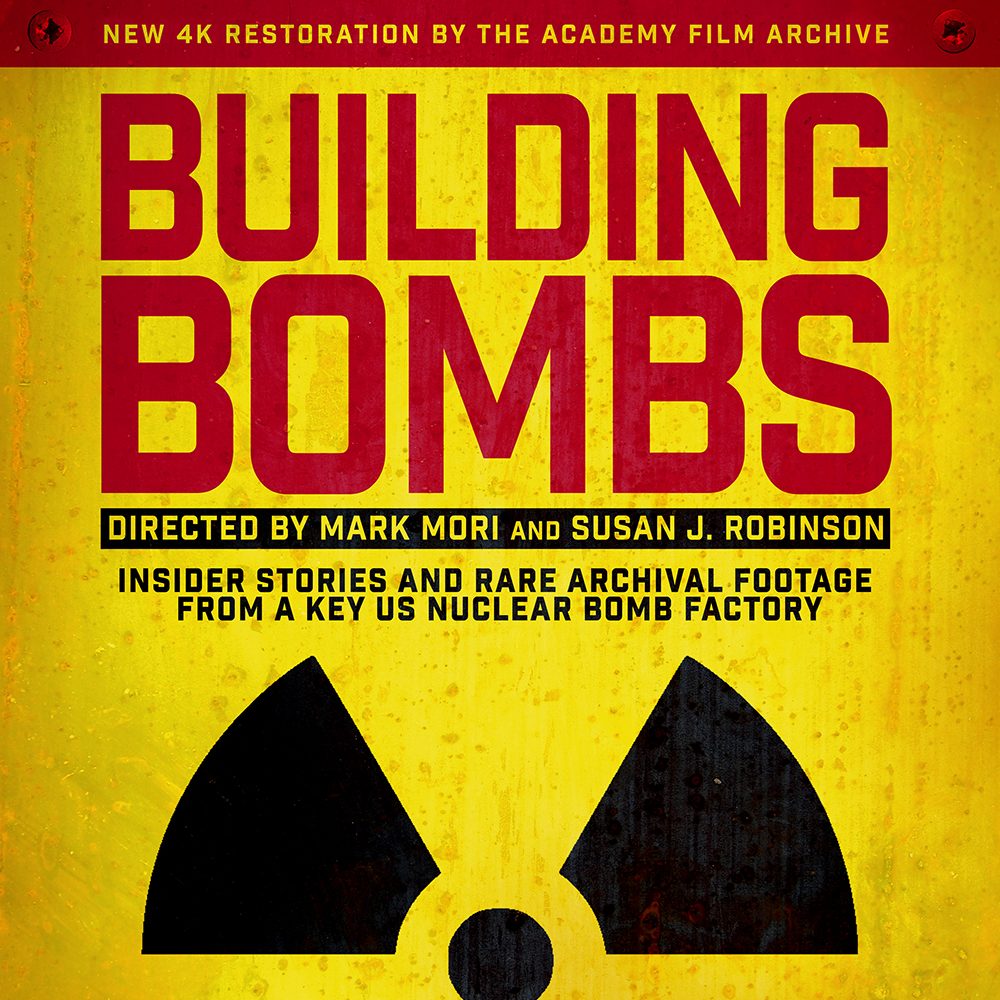 Poster advertising a film on nuclear power Building Bombs with the title set up in bold type in red set above the nuclear symbol in black