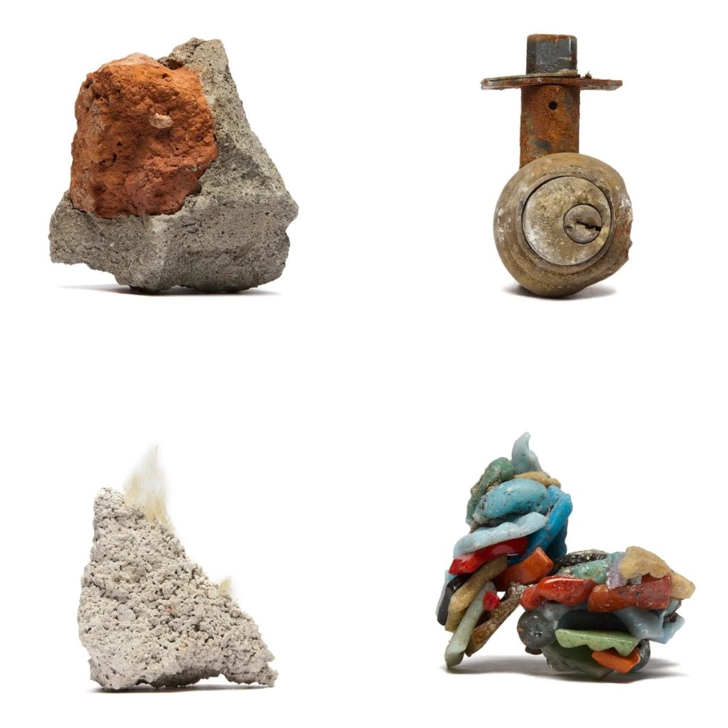 Image of four found-object art pieces set against a bright white background.