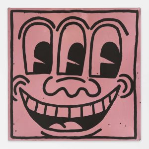a cartoon face with three eyes and a wide smiles drawn in think black lines on a mauve colored square