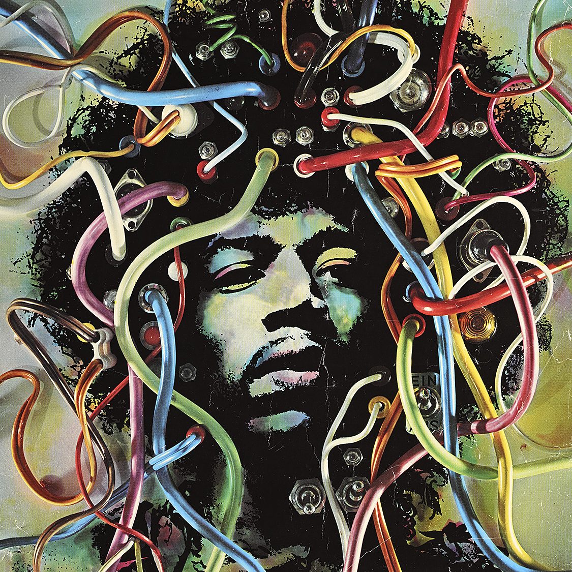 A multimedia poster of a man with an afro, with several colorful wires protruding from the image