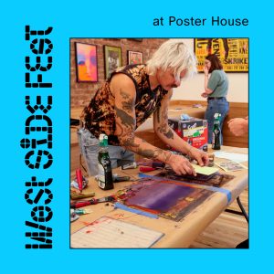 A person leaning over a table making a block print.